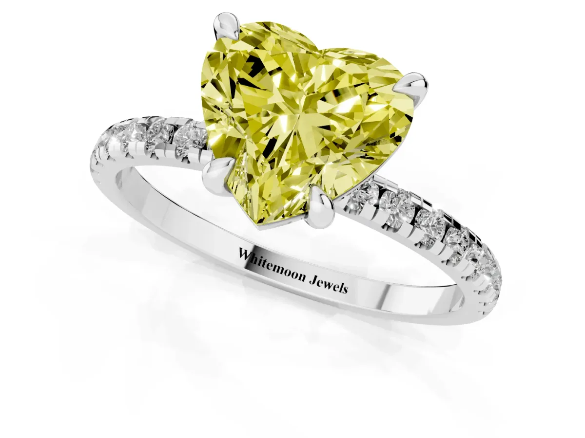 Fancy Yellow Heart Cut Diamond Brilliant Solitaire Ring with Pavé Band and Four-Prong Setting Platinum