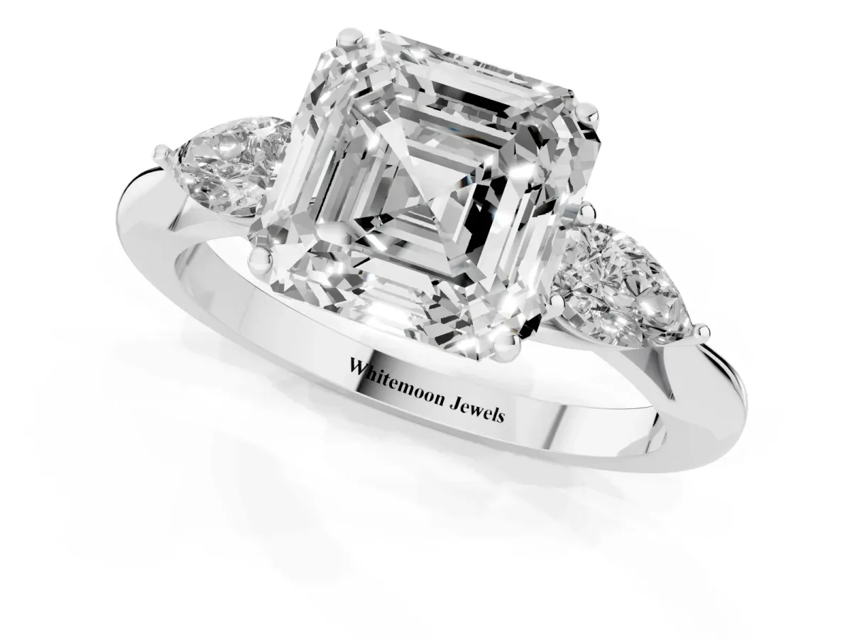 Asscher Cut Diamond Three-Stone Ring with Pear Side Stones and Prong Setting Platinum