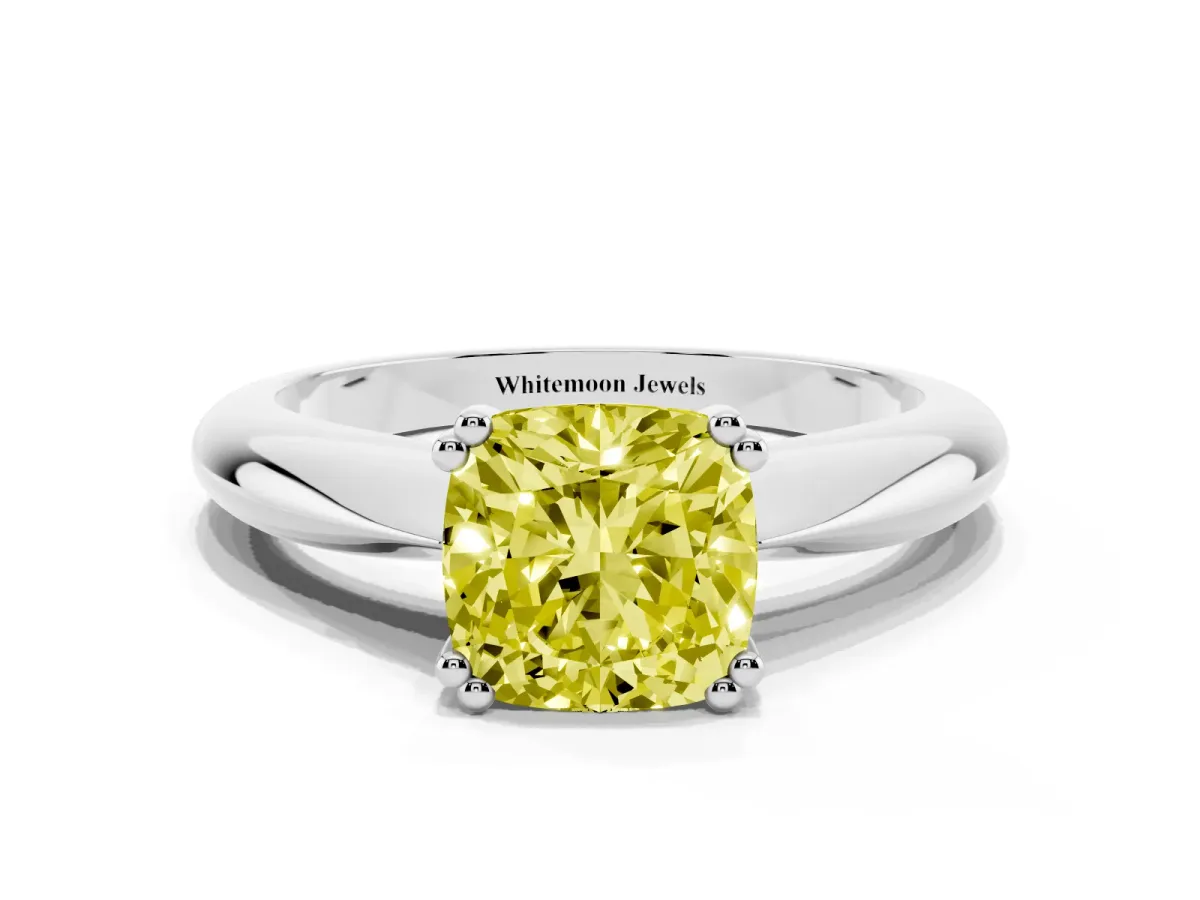 Fancy Yellow Cushion Cut Cut Solitaire Engagement Ring with Tapered Band and Four-Prong Setting Platinum