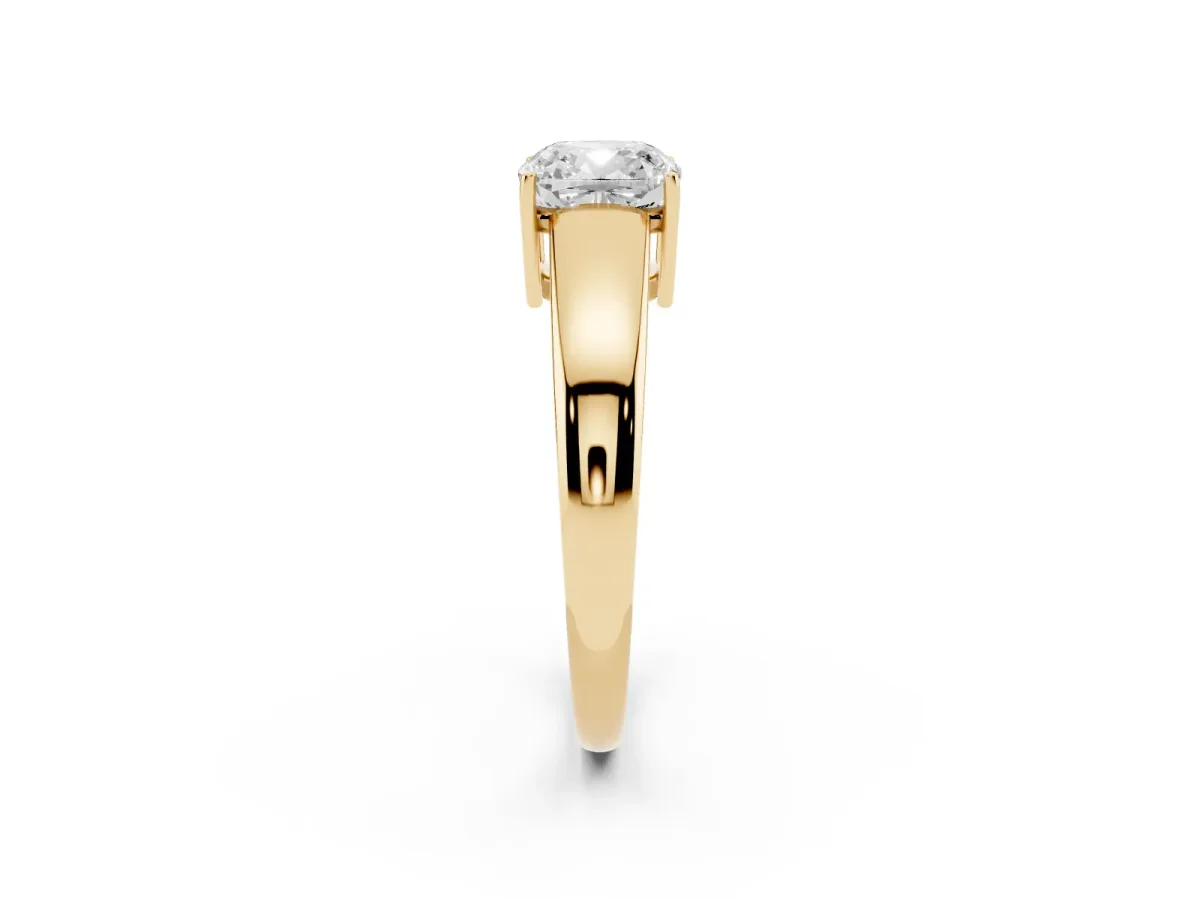 Cushion Cut Solitaire Diamond Ring with Tapered Band and Four-Prong Setting Yellow gold