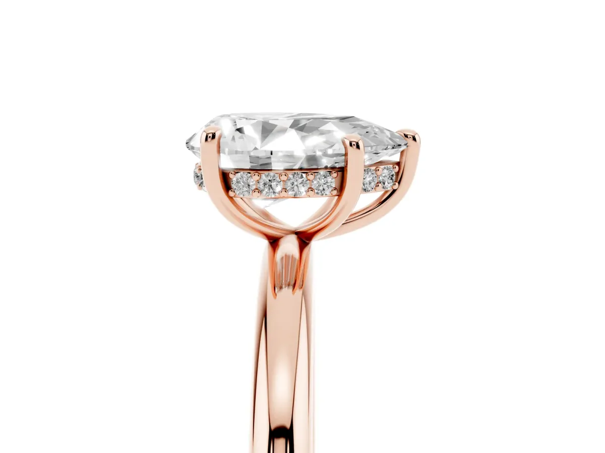 Pear Cut Diamond Solitaire Ring with Thin Band and Four-Prong Setting Rose gold