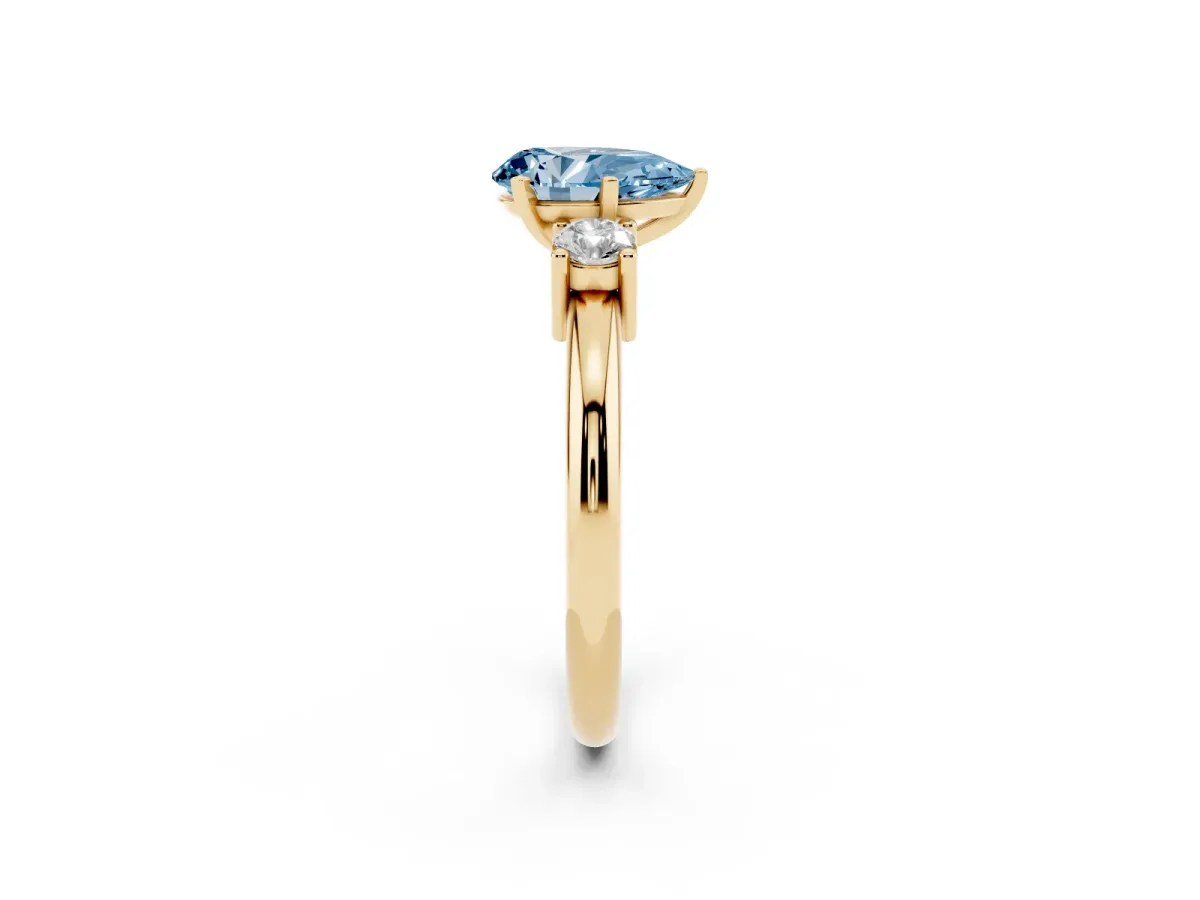 Fancy Blue Three-Stone Pear Cut Cut Diamond Solitaire with Prong Setting and Classic Band Yellow gold