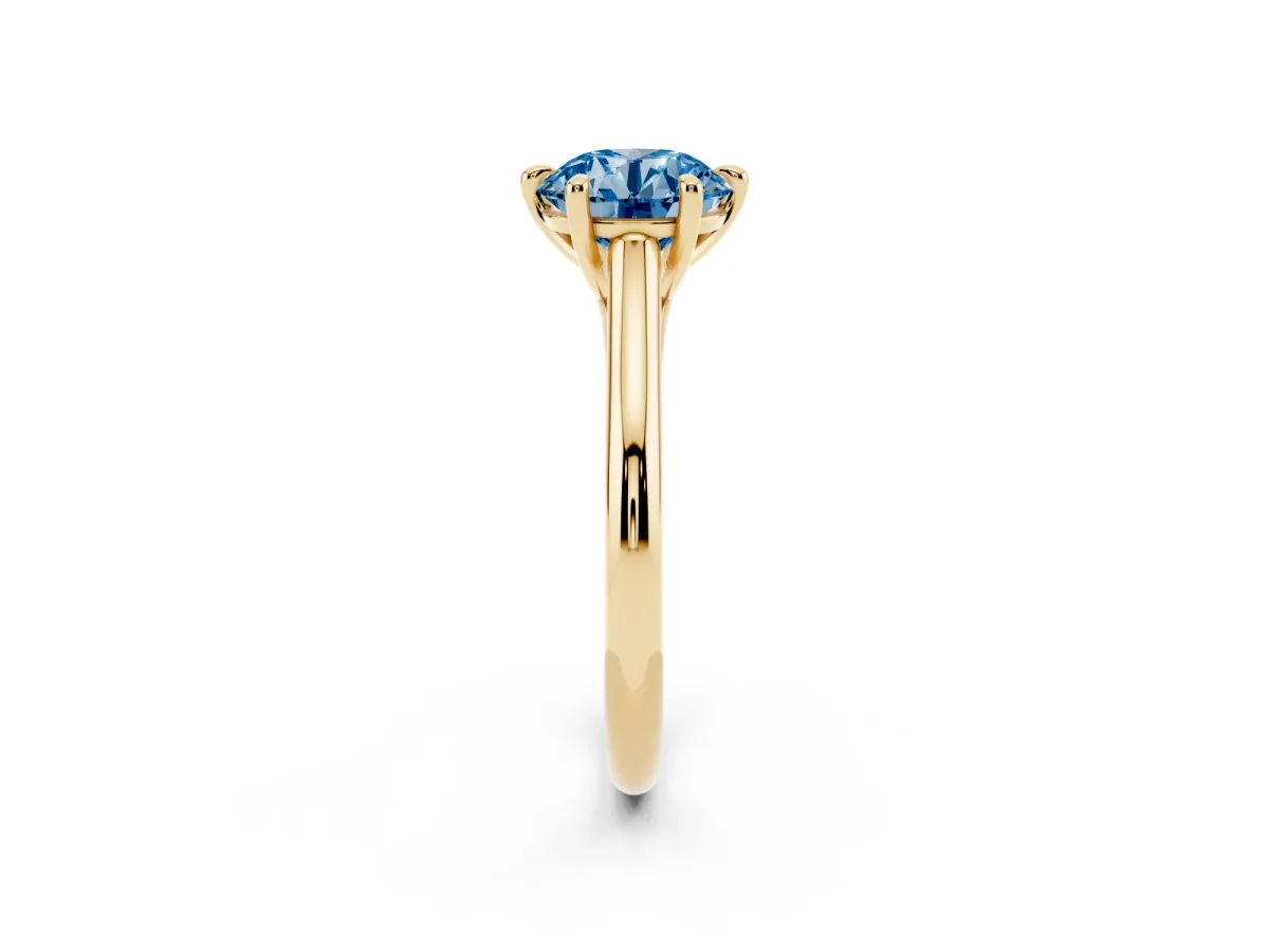 Fancy Blue Round Cut Solitaire Engagement Ring with Six-Prong Setting and Classic Band Yellow gold
