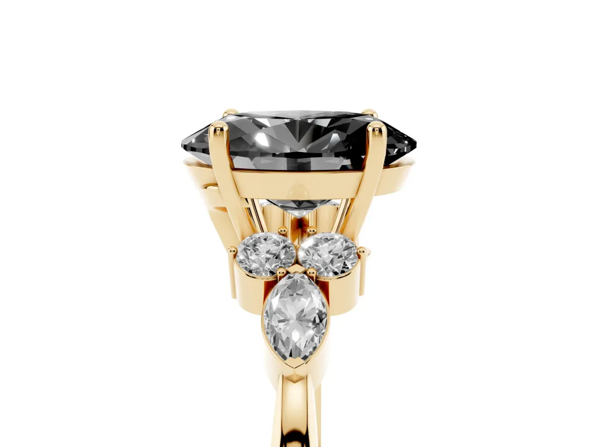Fancy Black Oval Cut Brilliant Diamond Solitaire Ring with Pear Side Stones and Four-Prong Setting Yellow gold