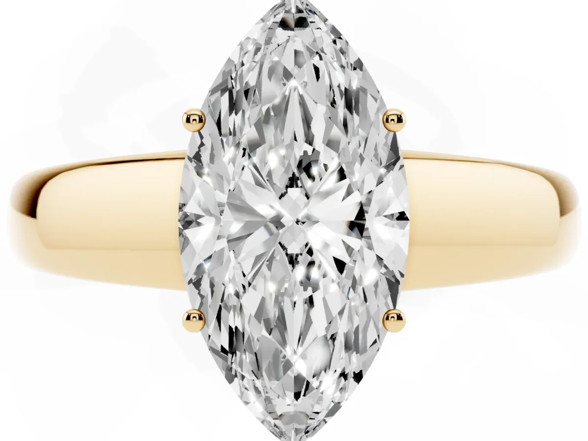 Marquise Cut Solitaire Diamond Ring with Tapered Band and Four-Prong Setting Yellow gold