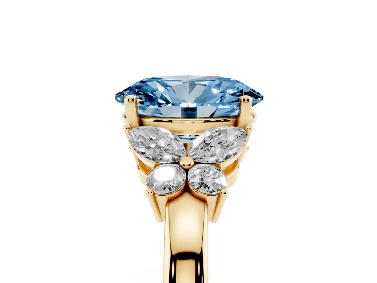 Fancy Blue Oval Cut Cut Solitaire Floral Diamond Ring with Four-Prong Setting Yellow gold