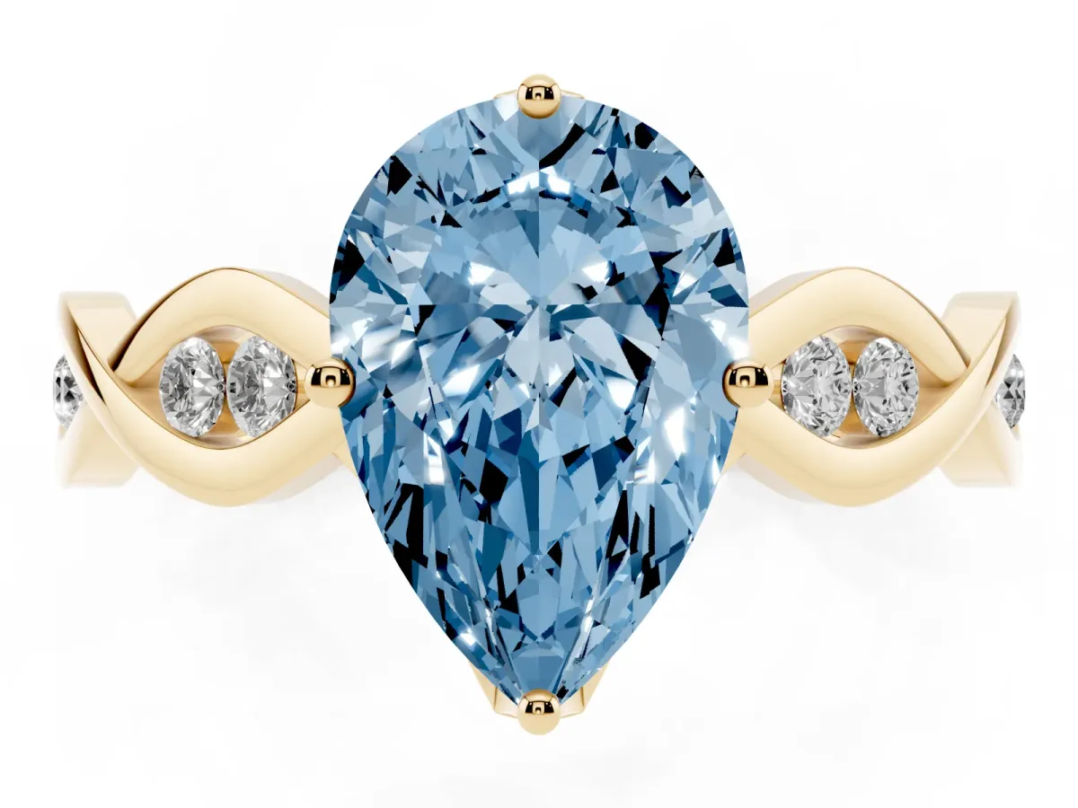 Fancy Blue Pear Cut Solitaire Twist Band with Leaf Prong Setting Yellow gold