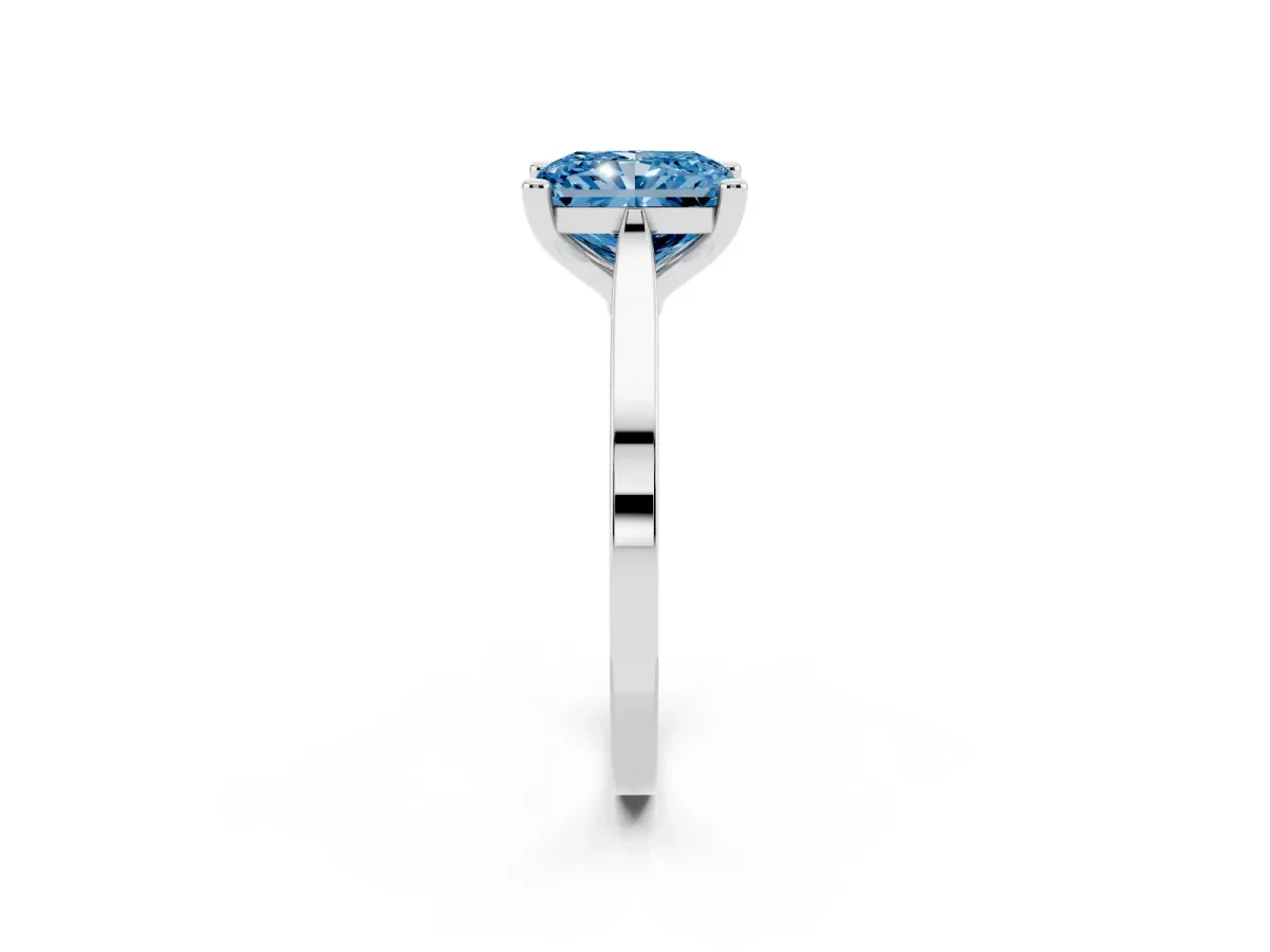Fancy Blue Radiant Cut Solitaire Diamond Ring with Four-Prong Setting and Tapered Band Silver