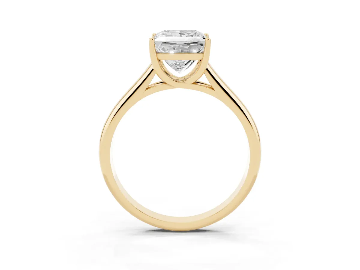 Princess Cut Solitaire Engagement Ring with Tapered Band and Four-Prong Setting Yellow gold