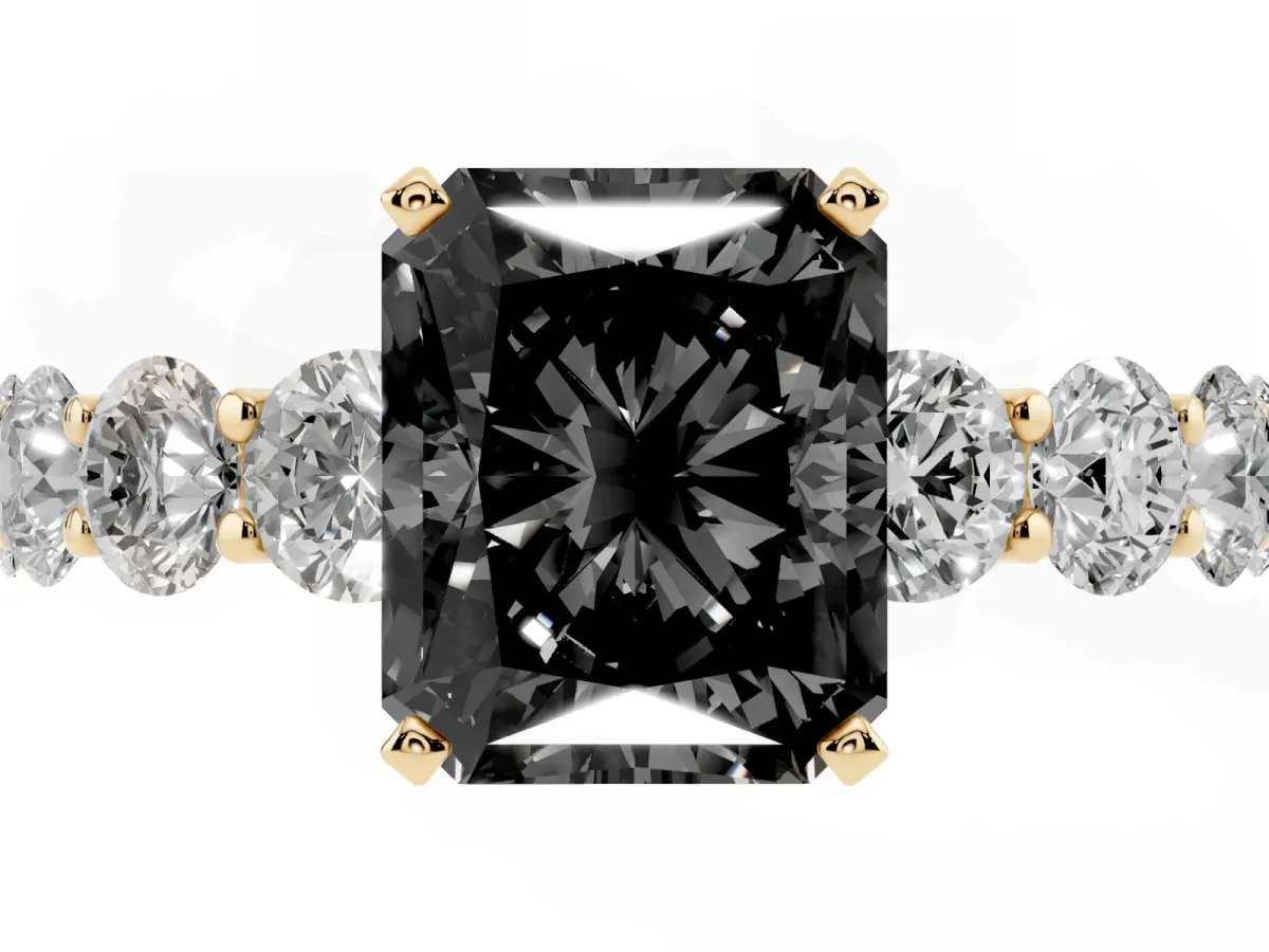 Fancy Black Radiant Cut Diamond Prong Setting with Side Stones on a Pave Band Yellow gold