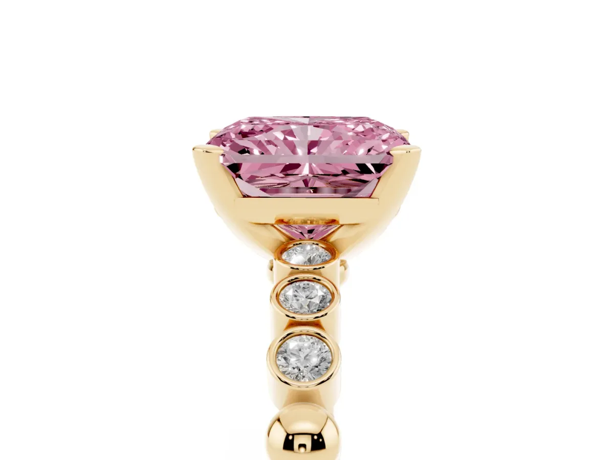 Fancy Pink Radiant Cut Solitaire Bezel Accent Diamond Engagement Ring with Beaded Band and Four-Prong Setting Yellow gold