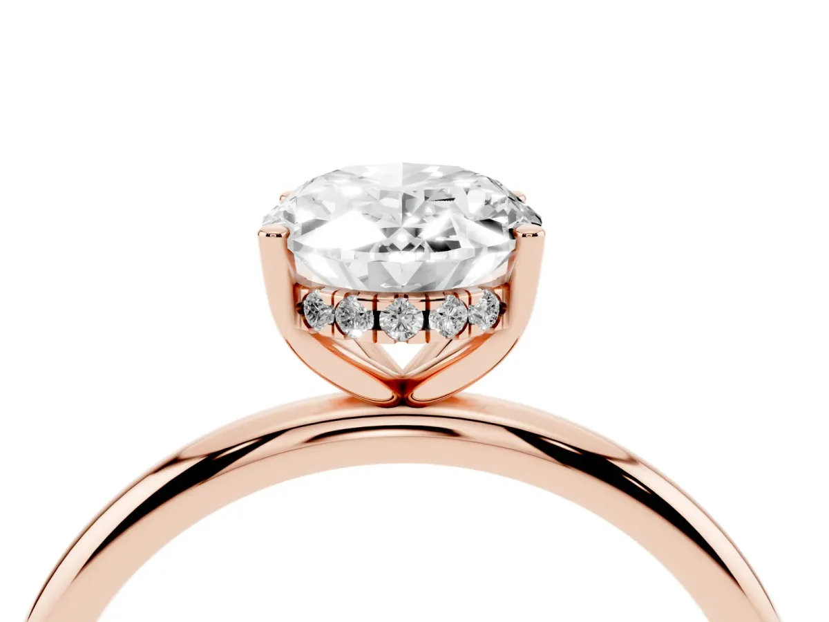 Oval Cut Cut Solitaire Engagement Ring with Four-Prong Setting and Classic Band Rose gold