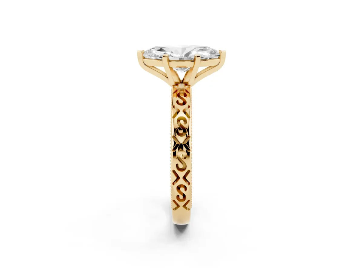 Marquise Cut Solitaire Engagement Ring with Scrollwork Band and Four-Prong Setting Yellow gold