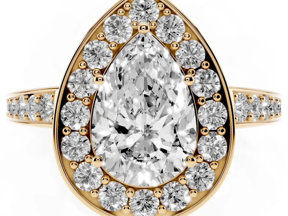 Pear Cut Halo Pavé Diamond Engagement Ring with Bezel Setting Yellow gold