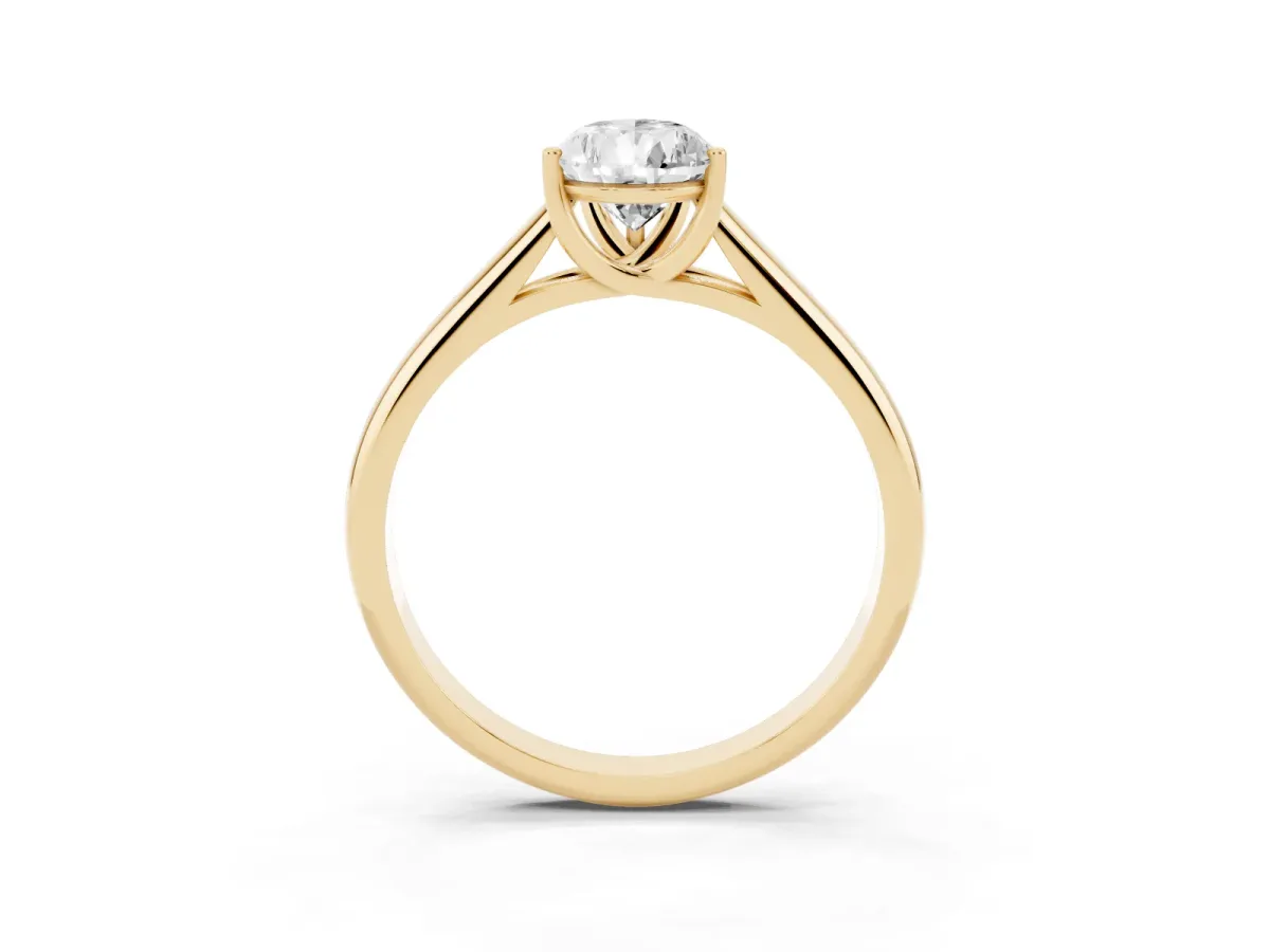 Pear Cut Solitaire Engagement Ring with Tapered Band and Four-Prong Setting Yellow gold