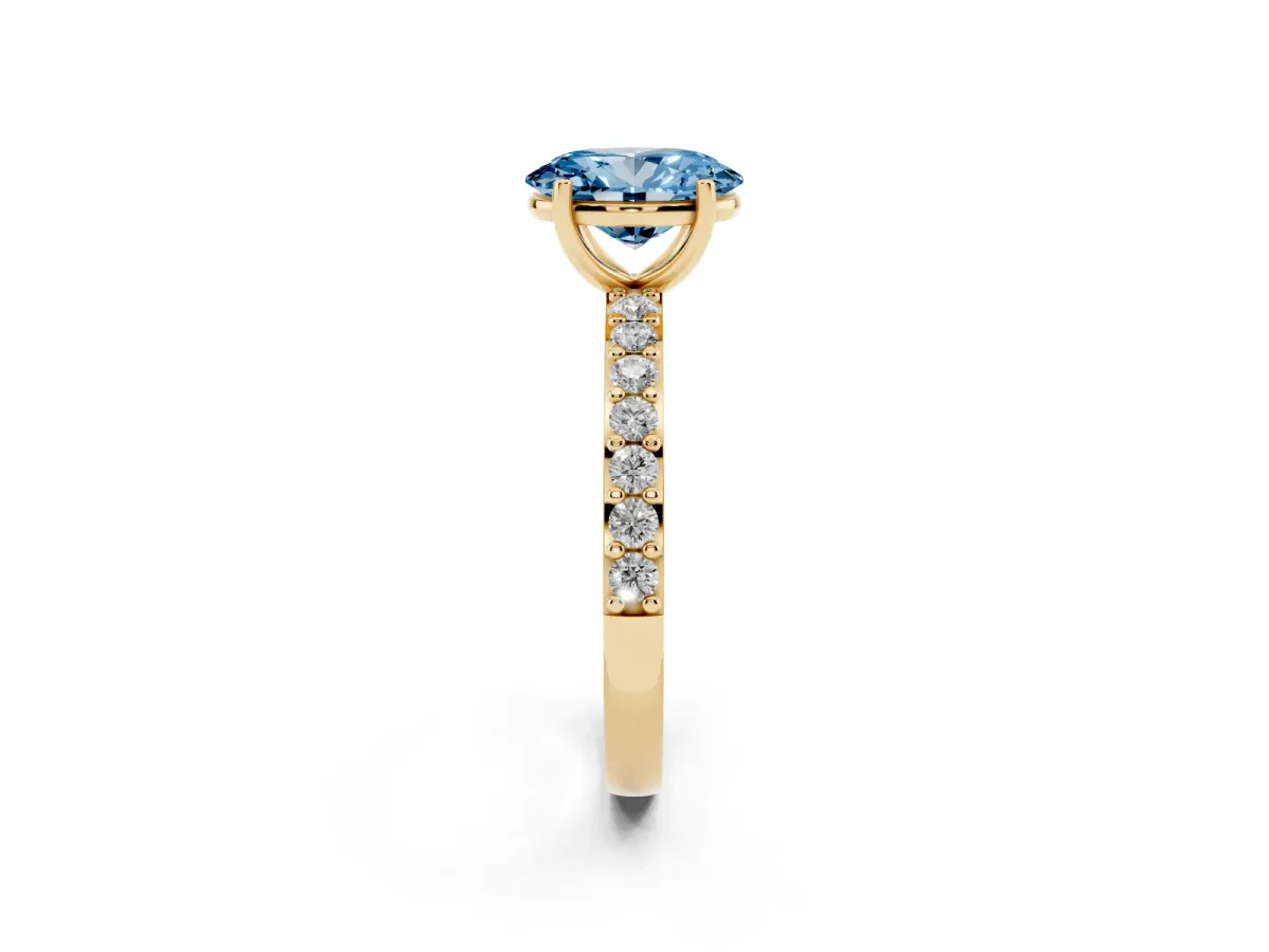 Fancy Blue Oval Cut Cut Diamond Solitaire with Pave Band and Four-Prong Setting Yellow gold