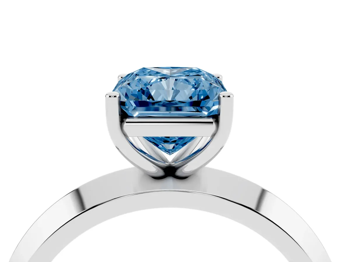 Fancy Blue Radiant Cut Cut Solitaire Engagement Ring with Flat Band and Four-Prong Setting Silver