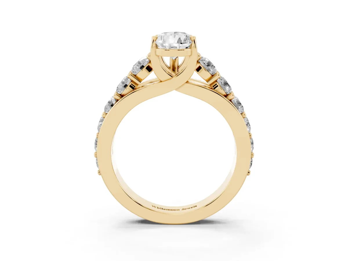 Pear Cut Diamond Engagement Ring with Pavé Band and Four-Prong Setting Yellow gold