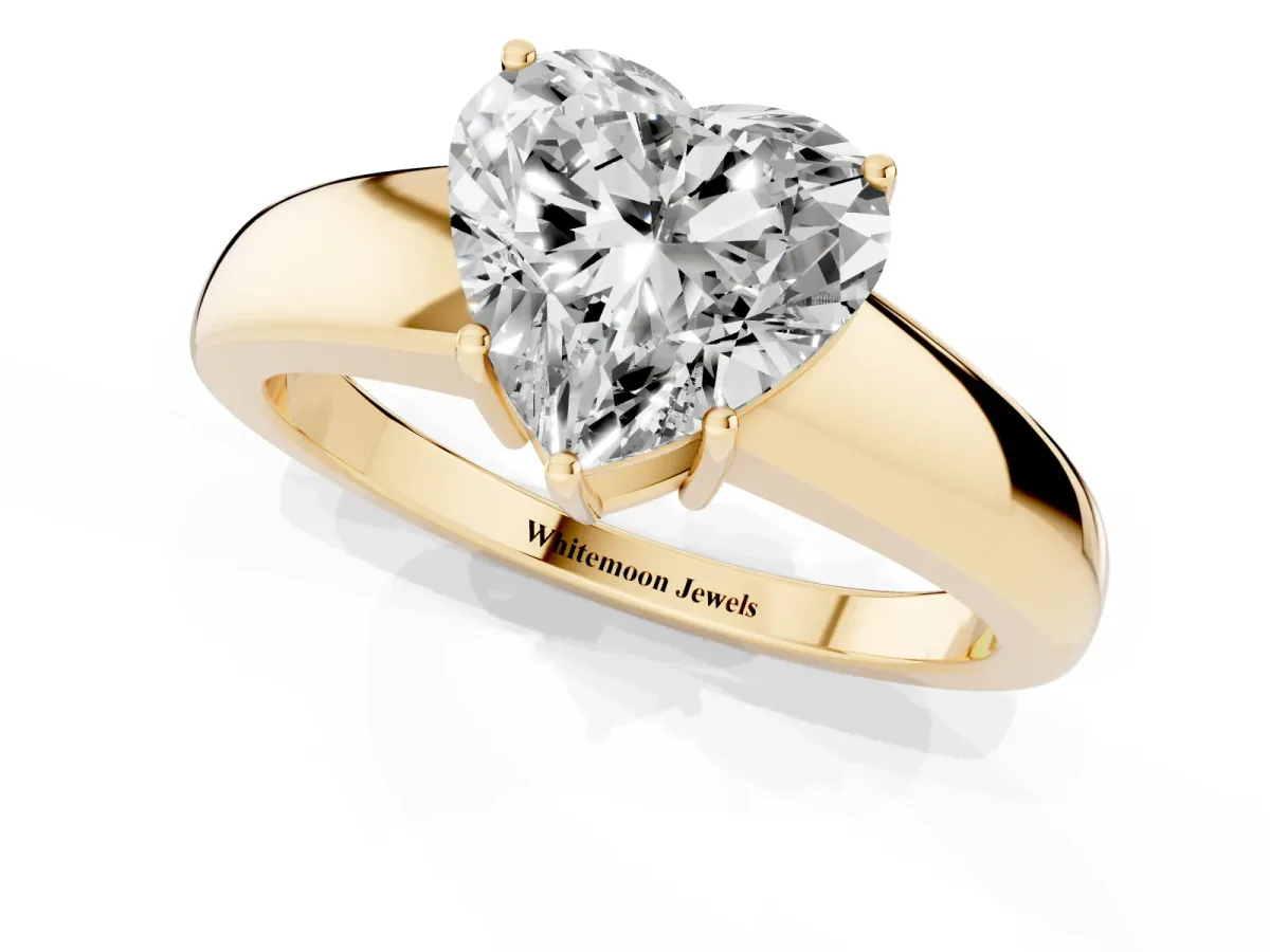 Heart Cut Solitaire Diamond Ring with Tapered Band and Four-Prong Setting Yellow gold