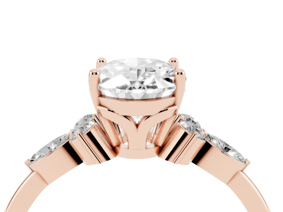 Oval Cut Brilliant Diamond Solitaire Ring with Pear Side Stones and Four-Prong Setting Rose gold