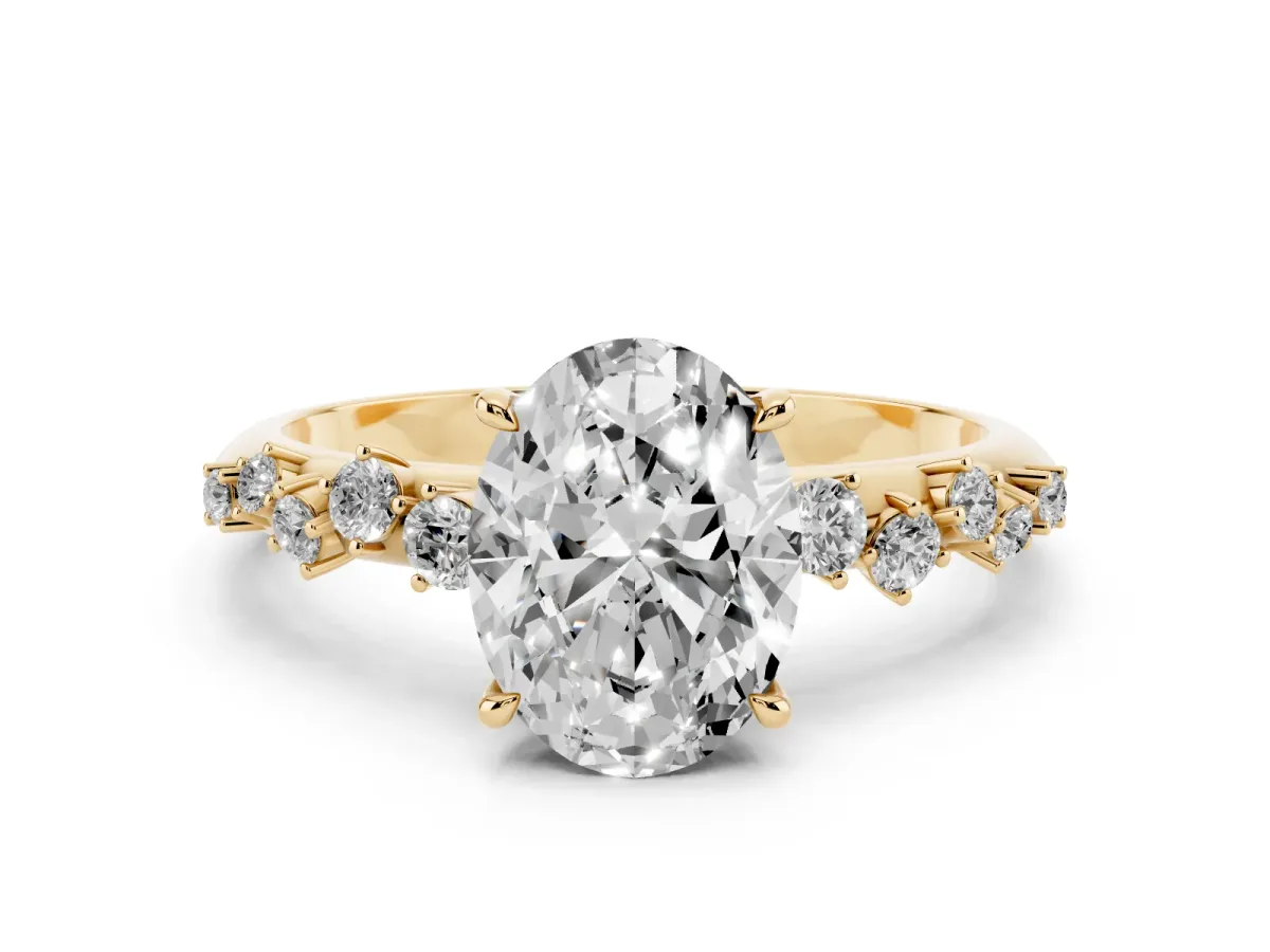 Oval Cut Diamond Cluster Side Stone Solitaire Ring with Prong Setting Yellow gold