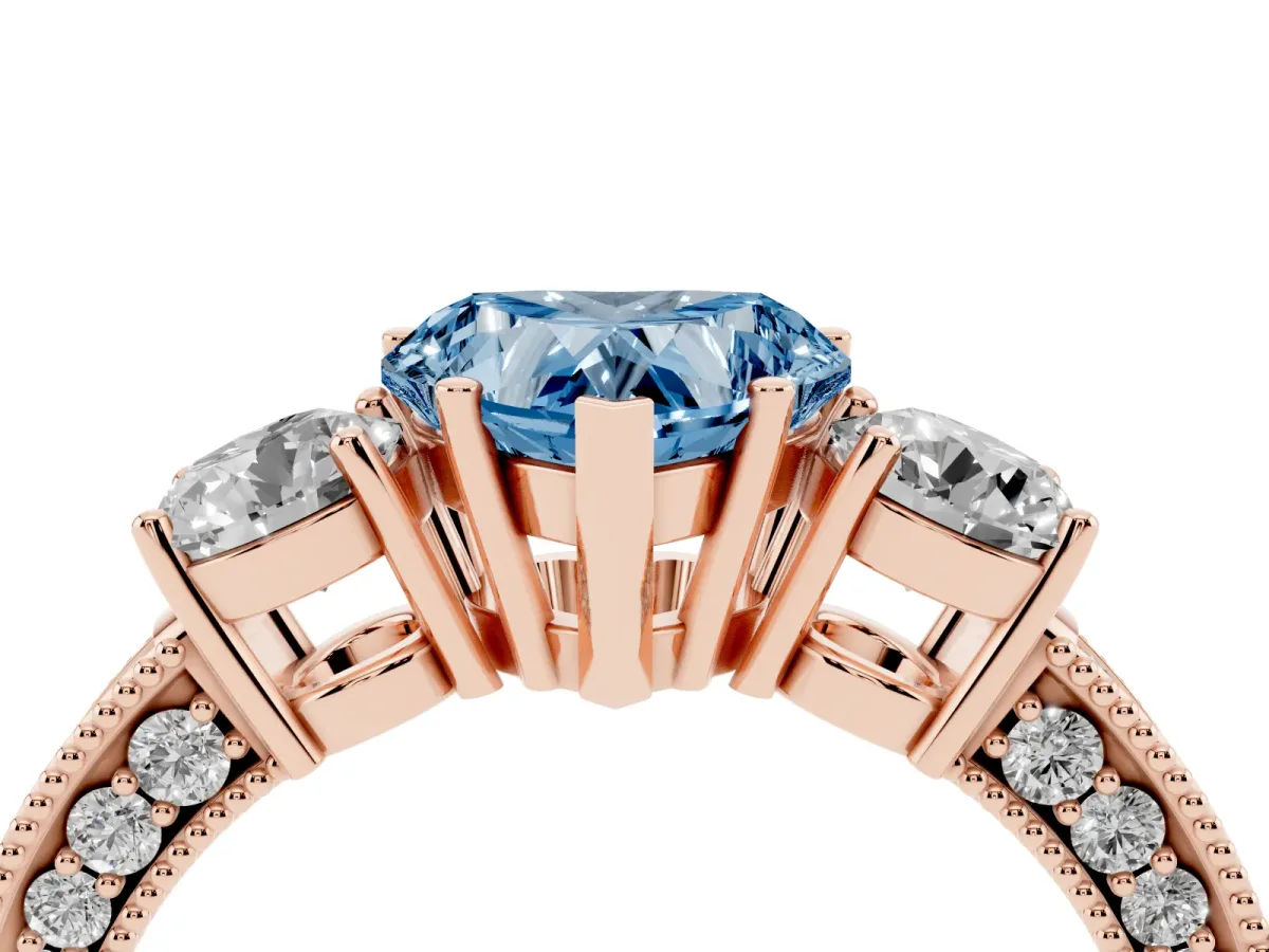 Fancy Blue Heart Cut Three-Stone Diamond Ring with Pavé Band and Four-Prong Setting Rose gold
