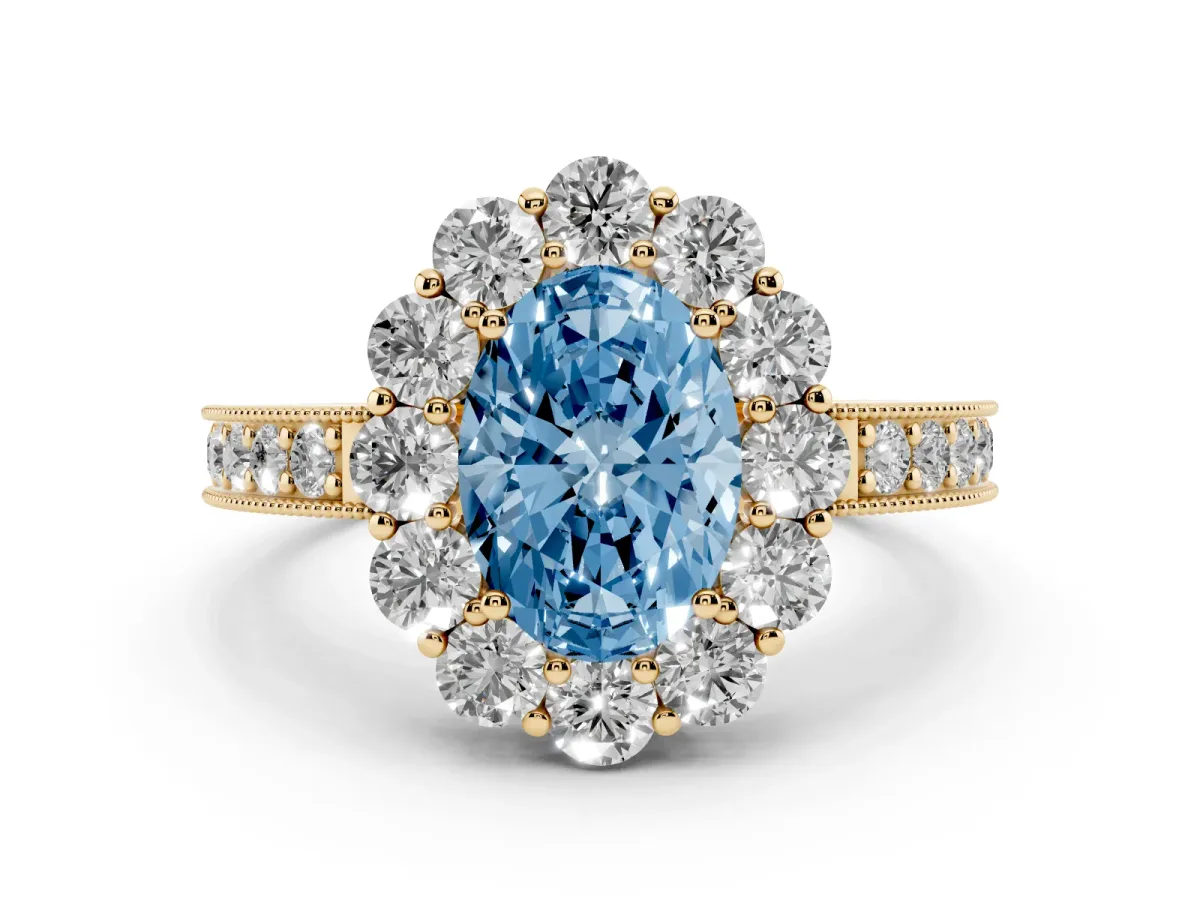 Fancy Blue Oval Cut Cut Halo Diamond Pavé Engagement Ring with Milgrain Detailing Yellow gold
