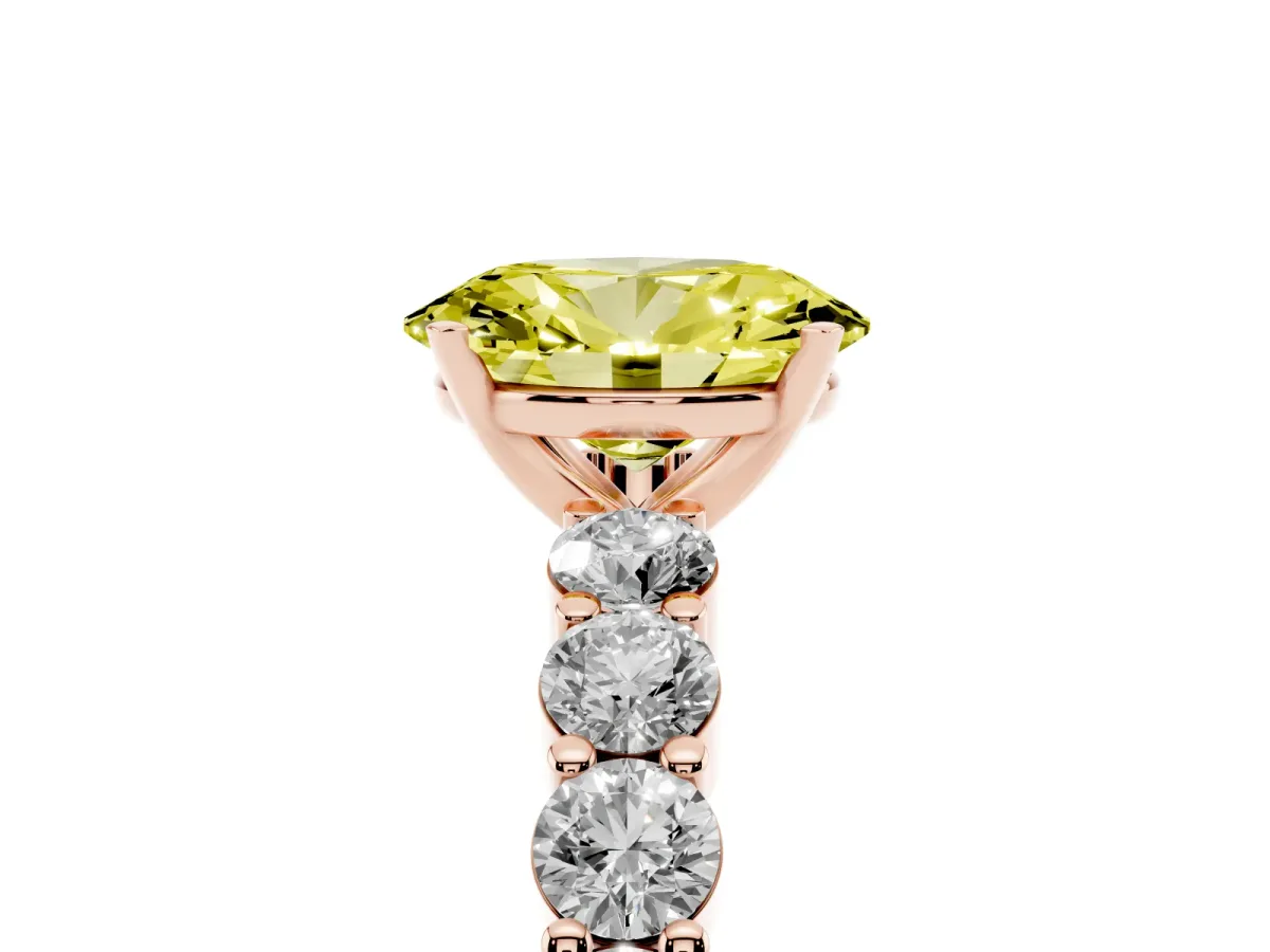 Fancy Yellow Oval Cut Diamond Solitaire Ring with Shared Prong Round Side Stones Rose gold