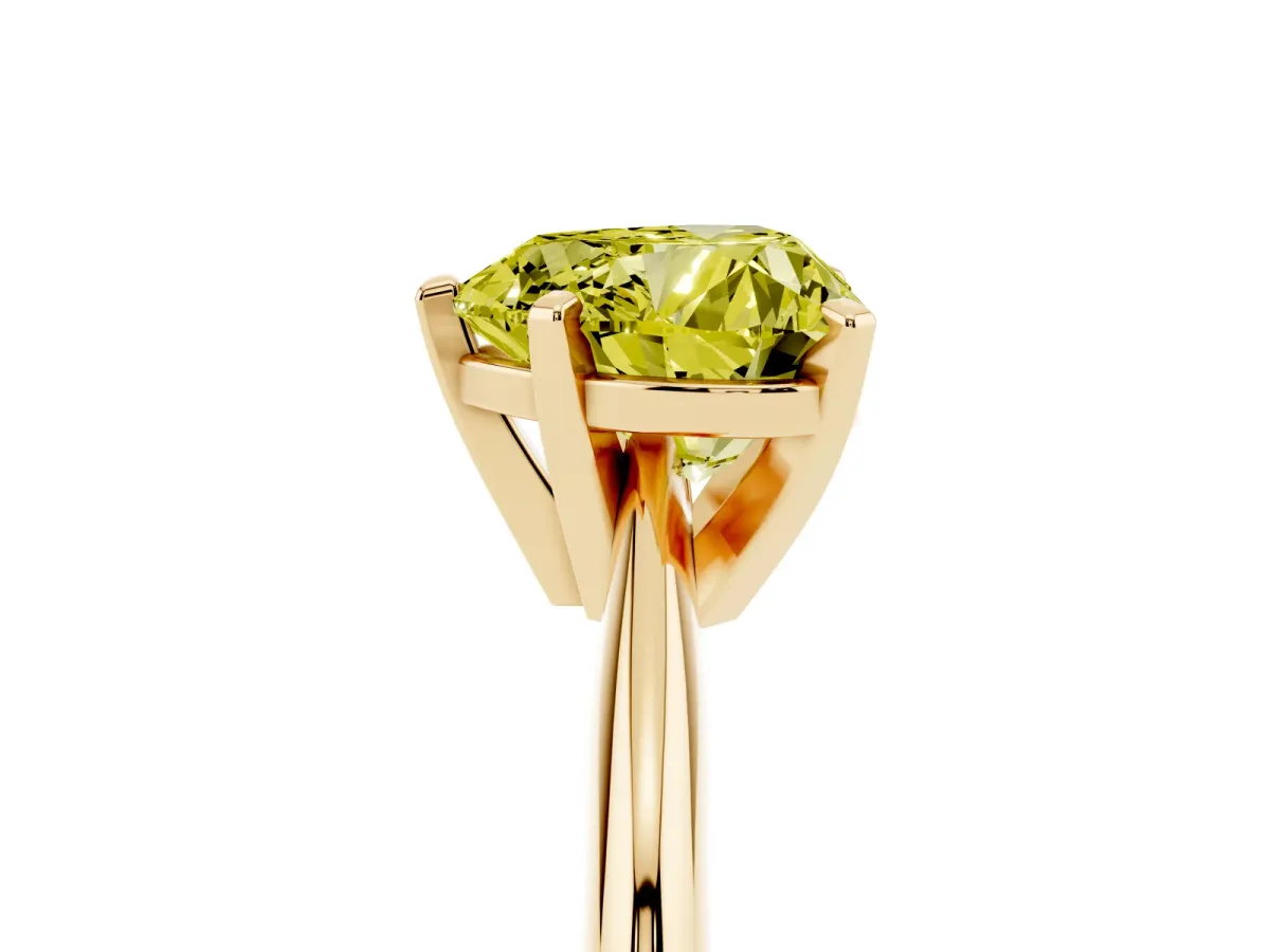 Fancy Yellow Heart Cut Cut Solitaire Ring with Four-Prong Setting on a Classic Band Yellow gold