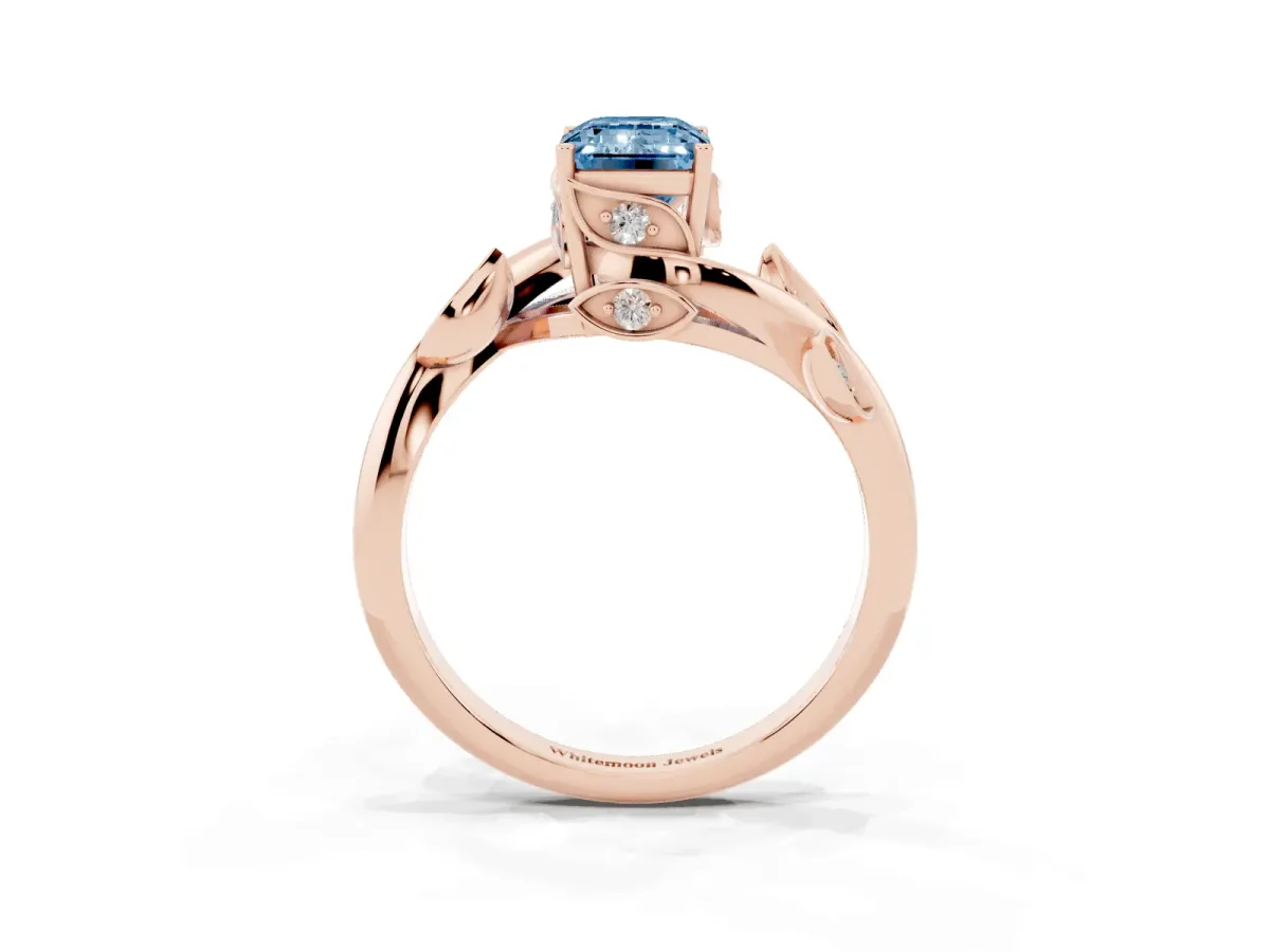 Fancy Blue Emerald Cut Solitaire Twist Engagement Ring with Leaf Accents and Prong Setting Rose gold