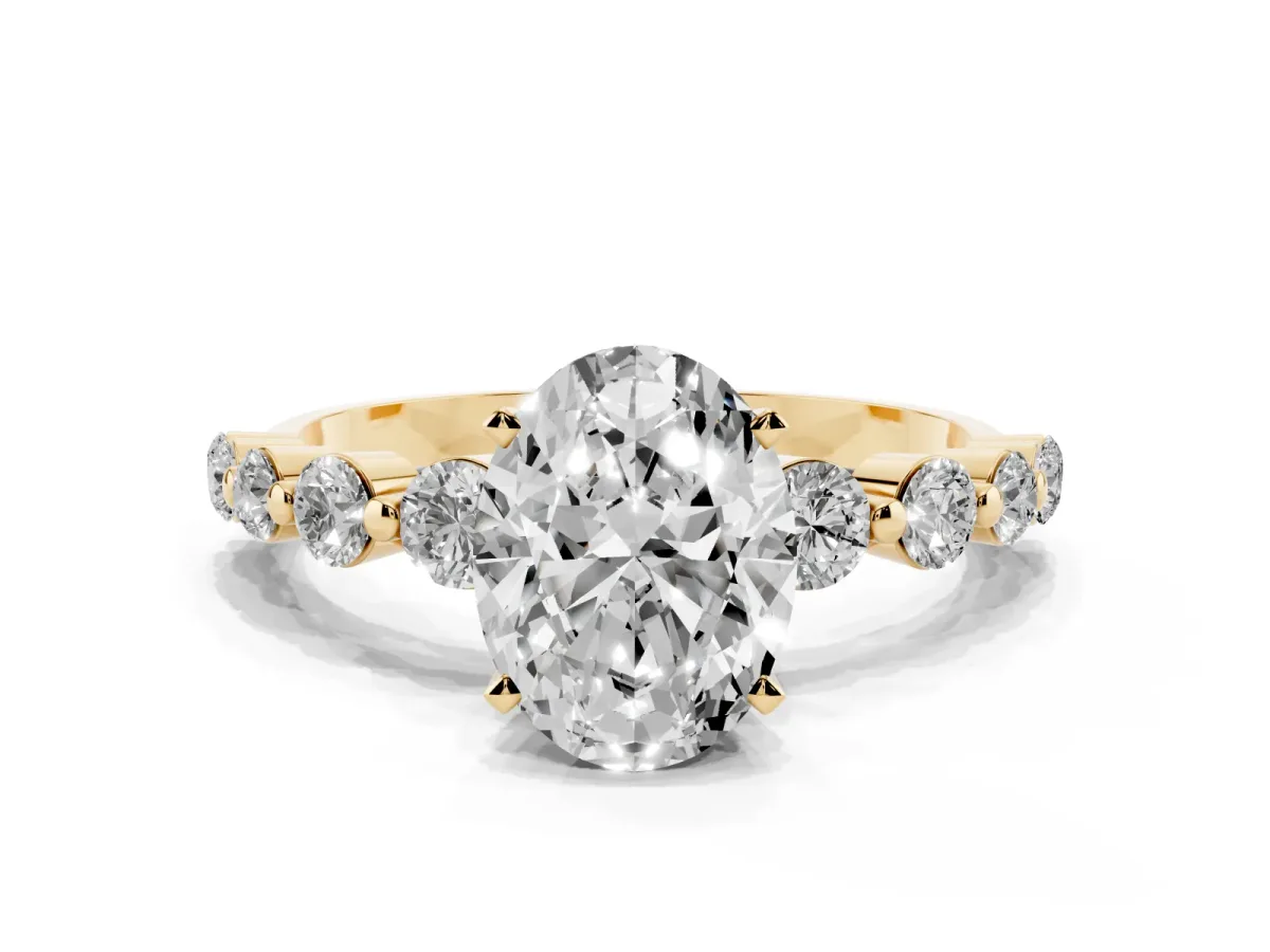 Oval Cut Solitaire Diamond Ring with Pave Band and Four-Prong Setting Yellow gold