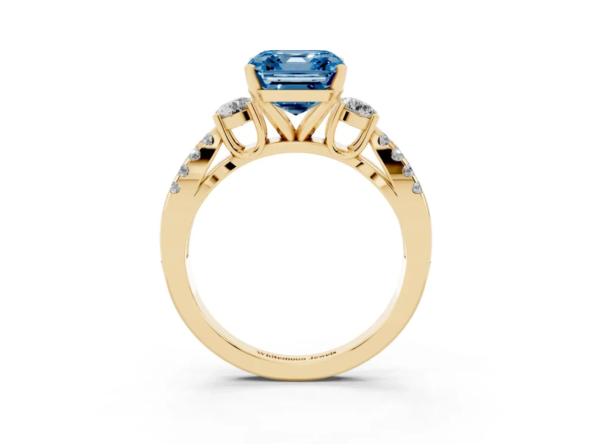 Fancy Blue Asscher Cut Diamond Three-Stone Ring with Pavé Split Shank and Four-Prong Setting Yellow gold