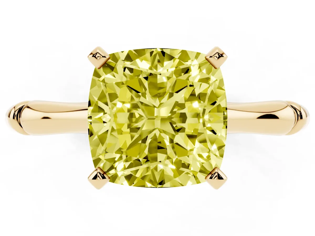 Fancy Yellow Cushion Cut Solitaire Diamond Ring with Bamboo Band and Four-Prong Setting Yellow gold