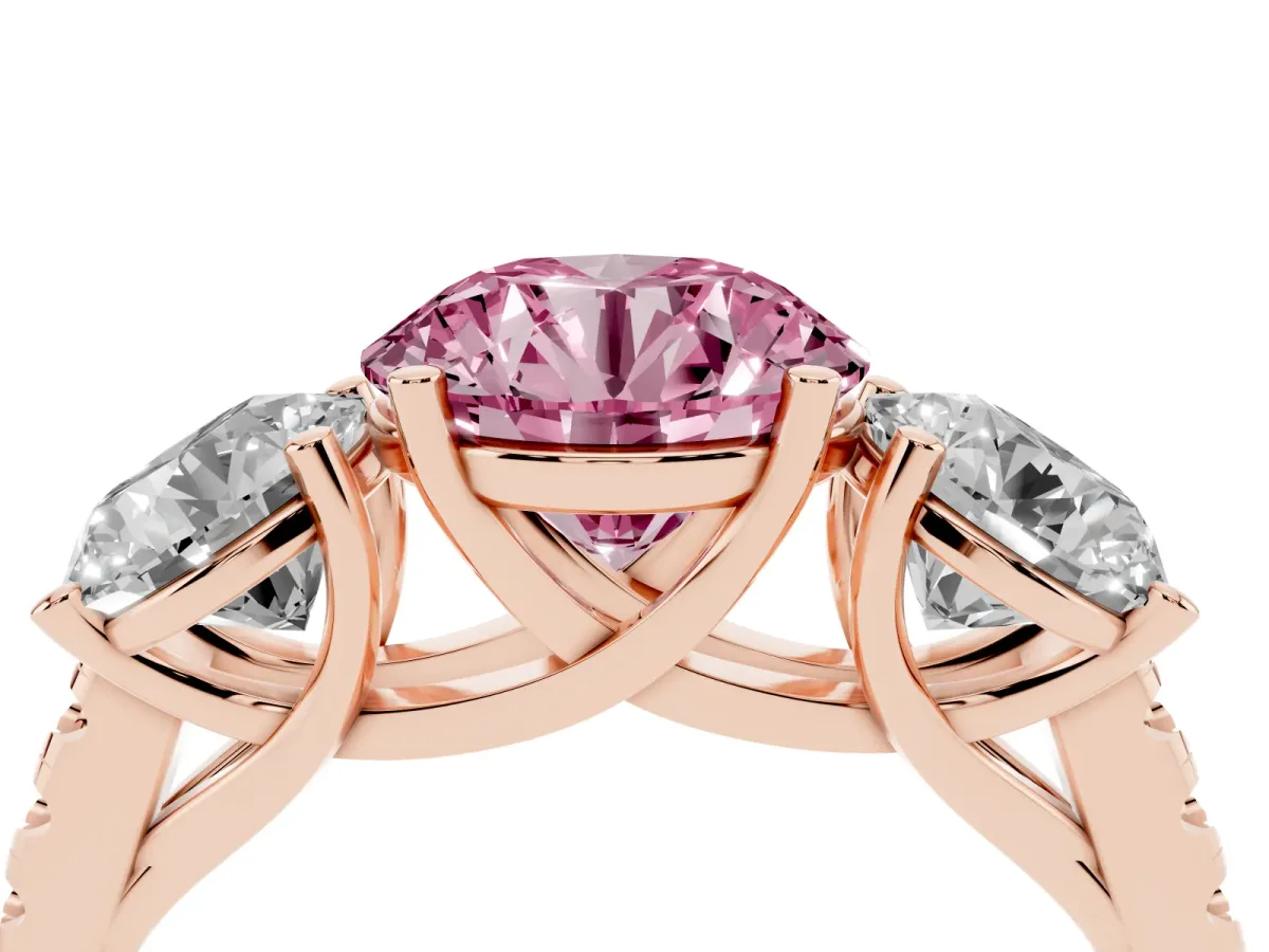 Fancy Pink Three-Stone Round Cut Diamond Ring with Round Pavé Band and Prong Setting Rose gold