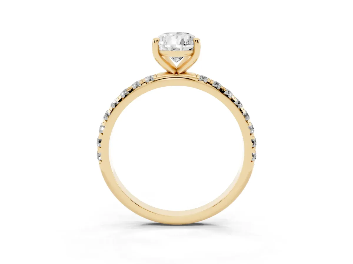Pear Cut Cut Diamond Solitaire Ring with Micro Pave Band and Four Prong Setting Yellow gold