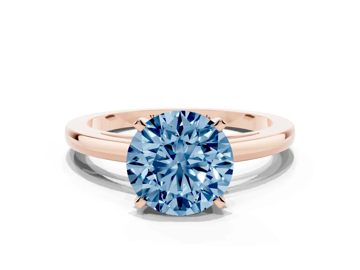 Fancy Blue Round Cut Solitaire Diamond Engagement Ring with Four-Prong Setting on a Classic Band Rose gold