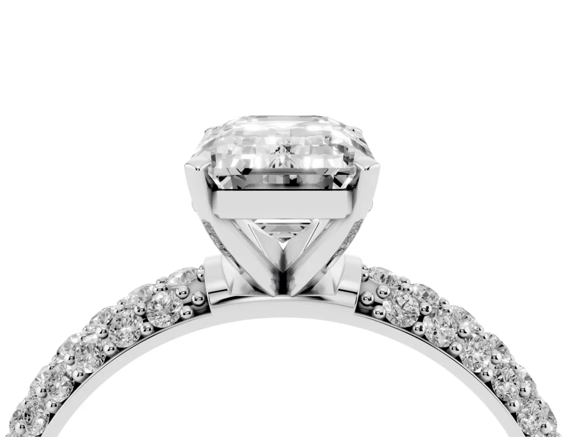 Emerald Cut Diamond Solitaire Ring with Prong Setting and Pavé Band Silver