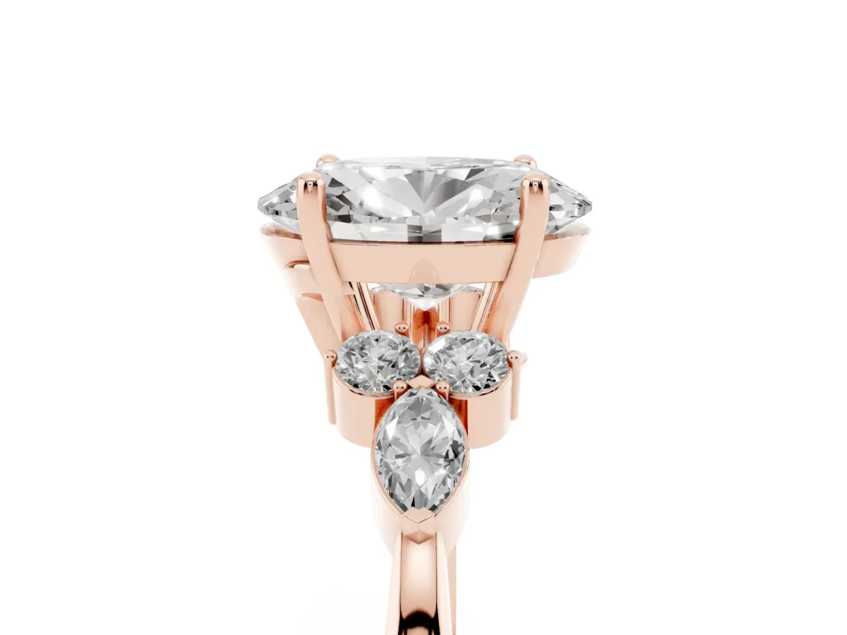 Oval Cut Brilliant Diamond Solitaire Ring with Pear Side Stones and Four-Prong Setting Rose gold