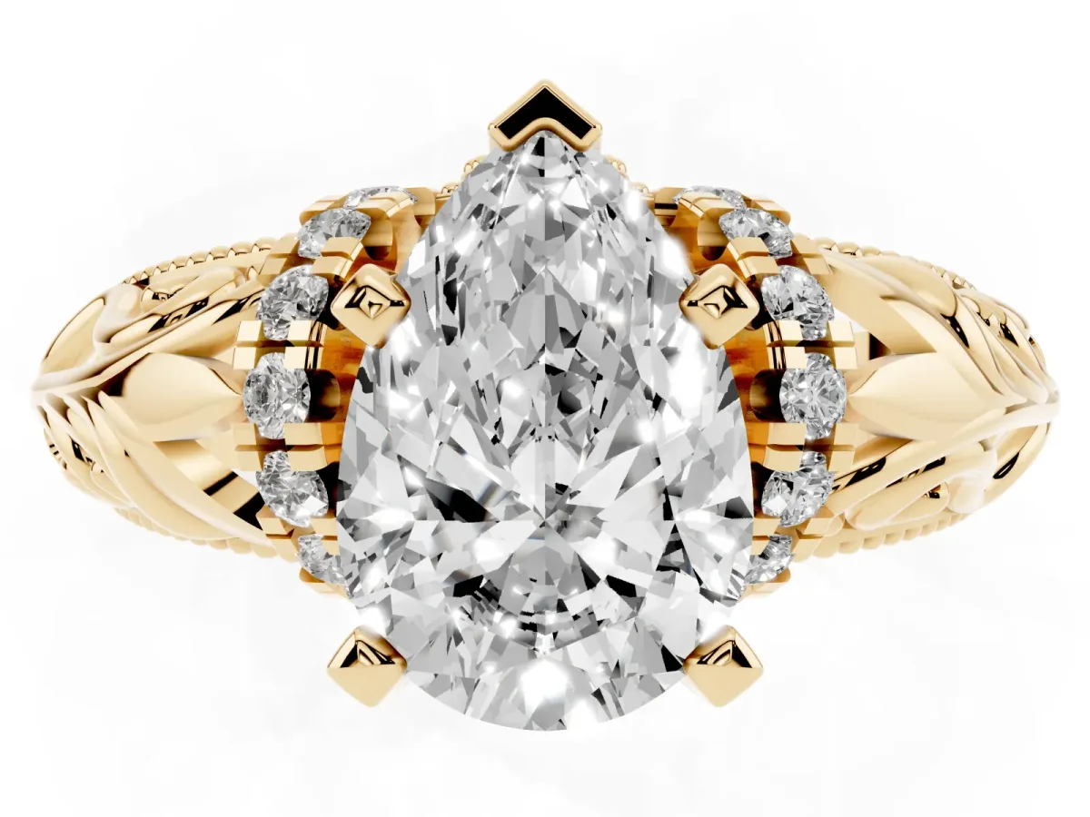 Pear Cut Solitaire Filigree Engagement Ring with Halo and Prong Setting Yellow gold