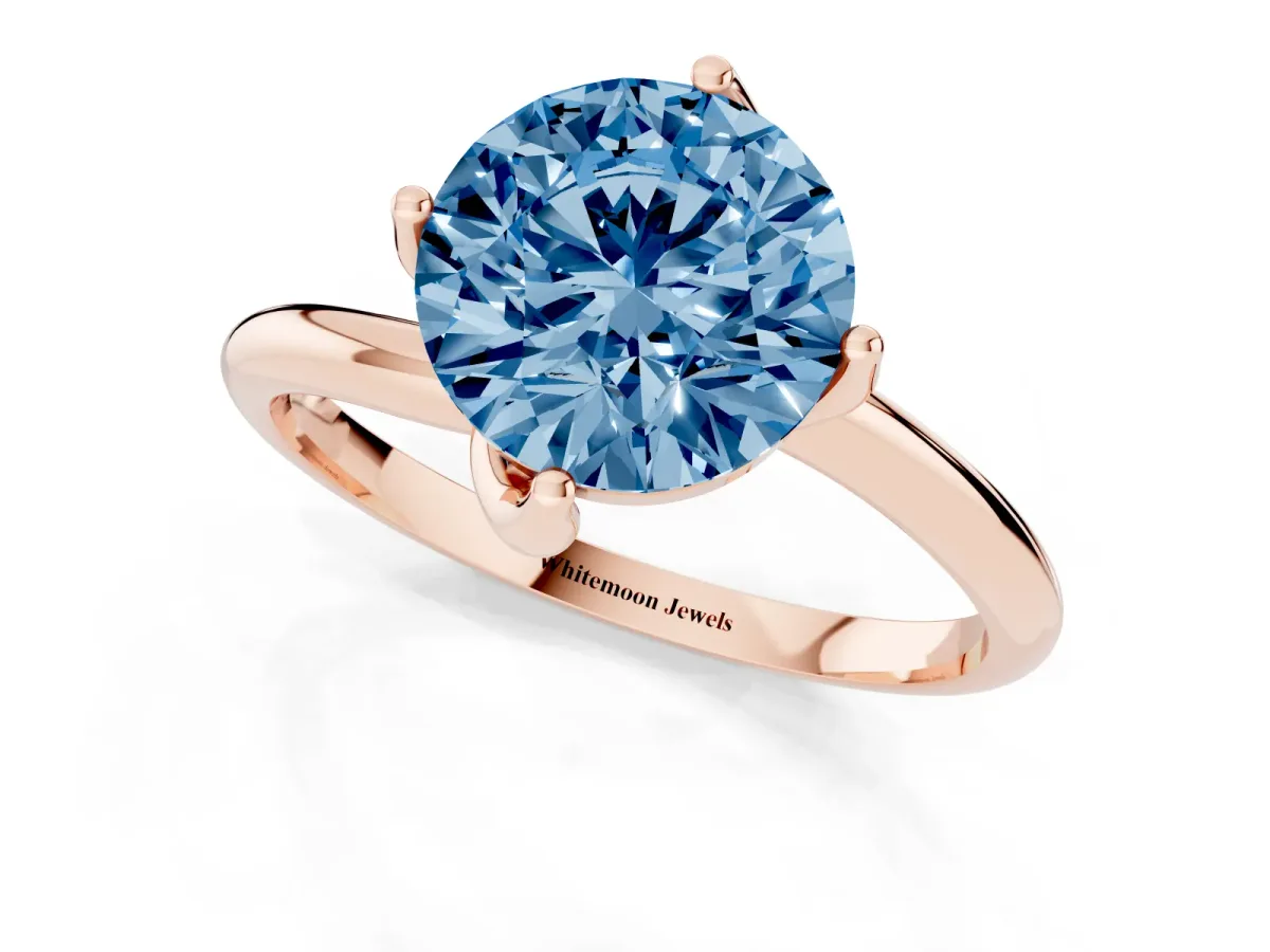 Fancy Blue Round Cut Diamond Solitaire Engagement Ring with Four-Prong Setting and Classic Band Rose gold