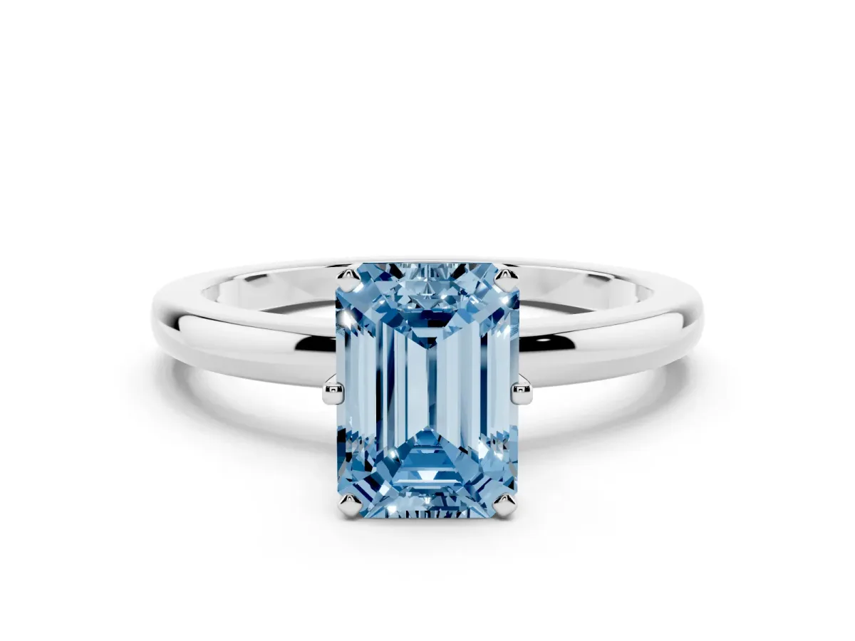 Fancy Blue Emerald Cut Solitaire Diamond Ring with Six-Prong Setting on a Classic Band Platinum