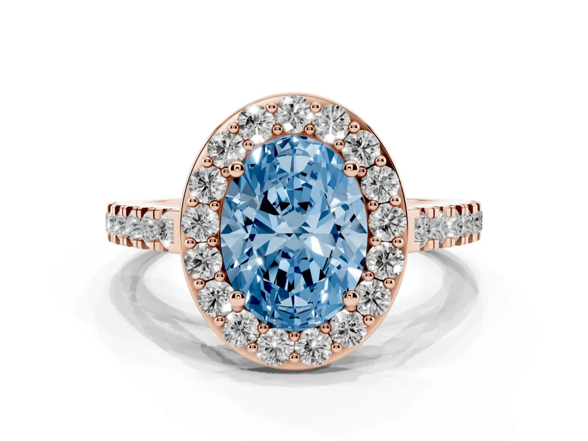 Fancy Blue Oval Cut Diamond Halo Ring with Round Pavé Split Shank and Prong Setting Rose gold