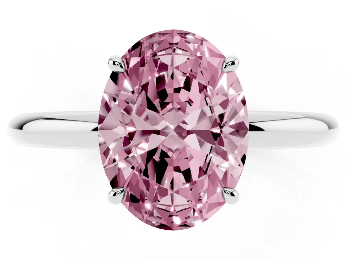 Fancy Pink Oval Cut Diamond Solitaire Ring with Thin Band and Four-Prong Setting Silver