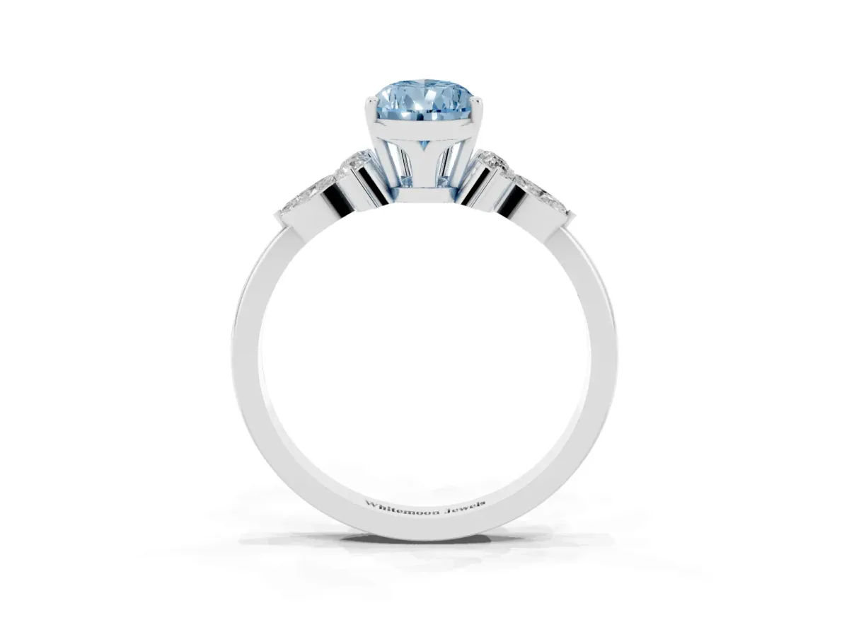 Fancy Blue Pear Cut Brilliant Diamond Solitaire Ring with Pear Side Stones and Four-Prong Setting Silver