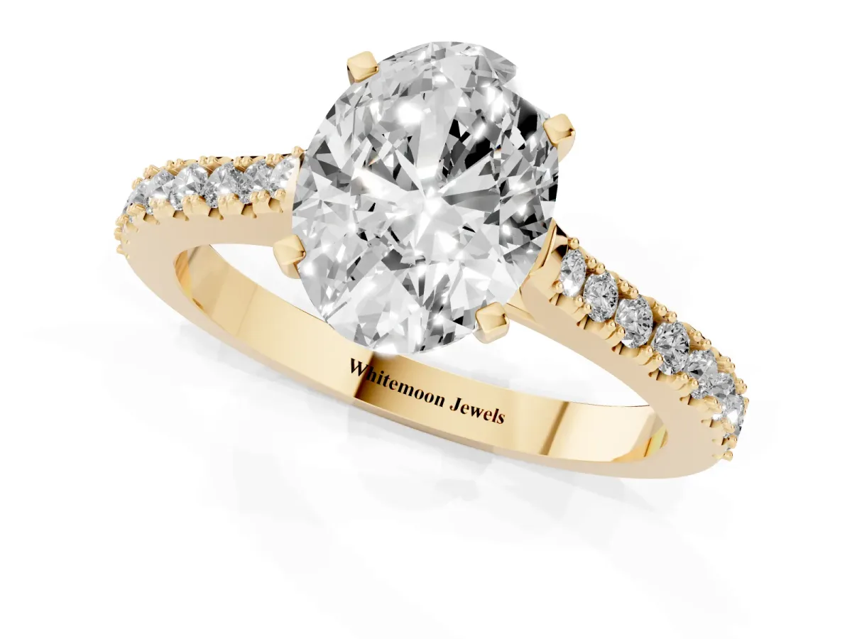 Oval Cut Cut Solitaire Diamond Engagement Ring with Pave Band and Four-Prong Setting Yellow gold