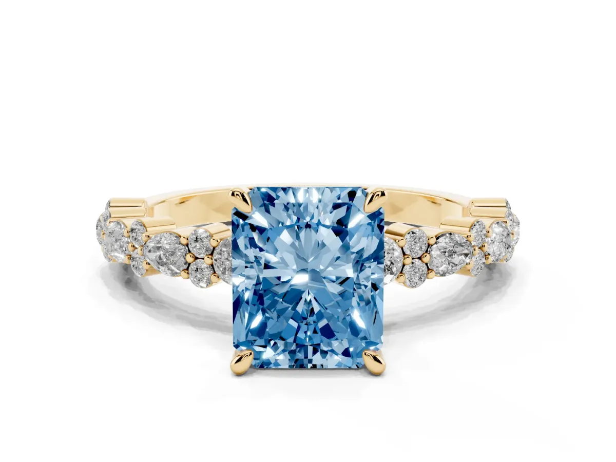 Fancy Blue Radiant Cut Diamond Side Stone Solitaire Ring with Round and Four-Prong Setting Yellow gold