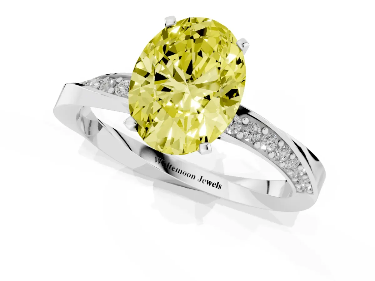 Fancy Yellow Oval Cut Diamond Engagement Ring with Side Stone Accents and Four-Prong Setting Silver