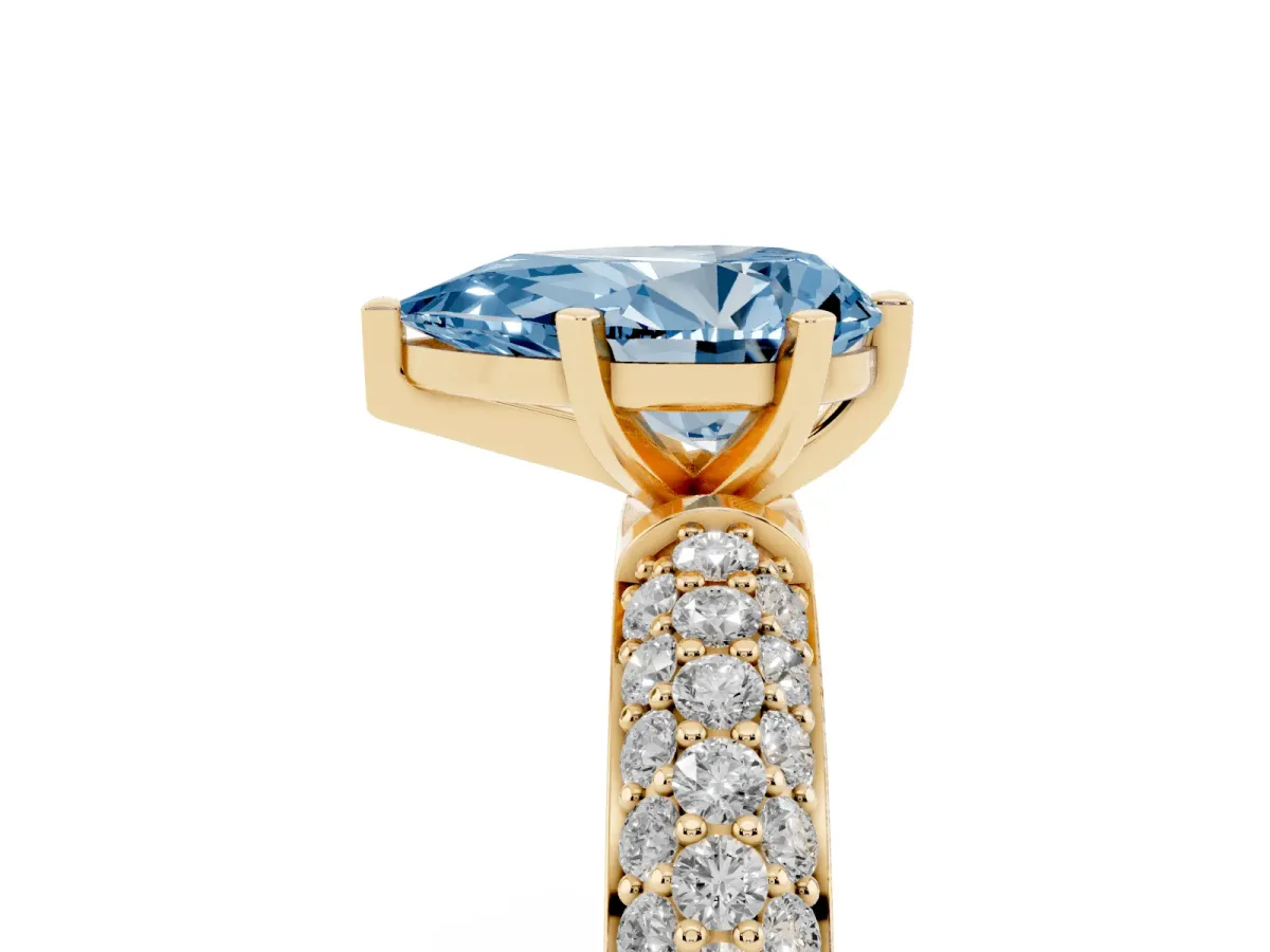 Fancy Blue Pear Cut Diamond Solitaire Ring with Prong Setting and Pavé Band Yellow gold