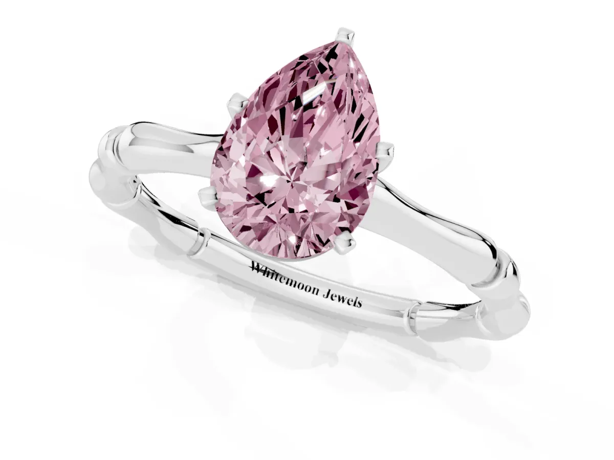 Fancy Pink Pear Cut Solitaire Diamond Ring with Bamboo Band and Four-Prong Setting Platinum