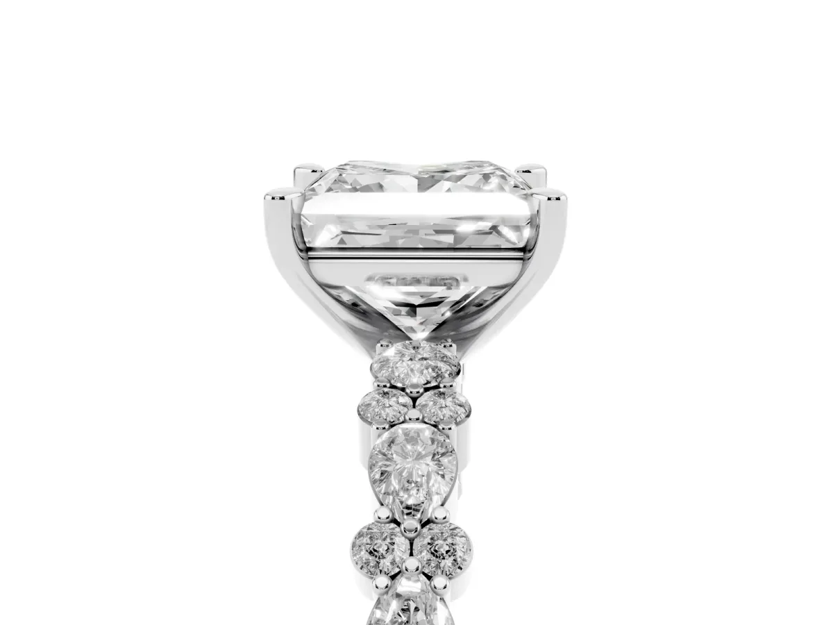 Princess Cut Diamond Side Stone Solitaire Ring with Round and Four-Prong Setting Platinum